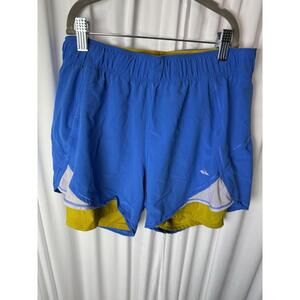 Brooks running short blue and yellow size womens  medium
